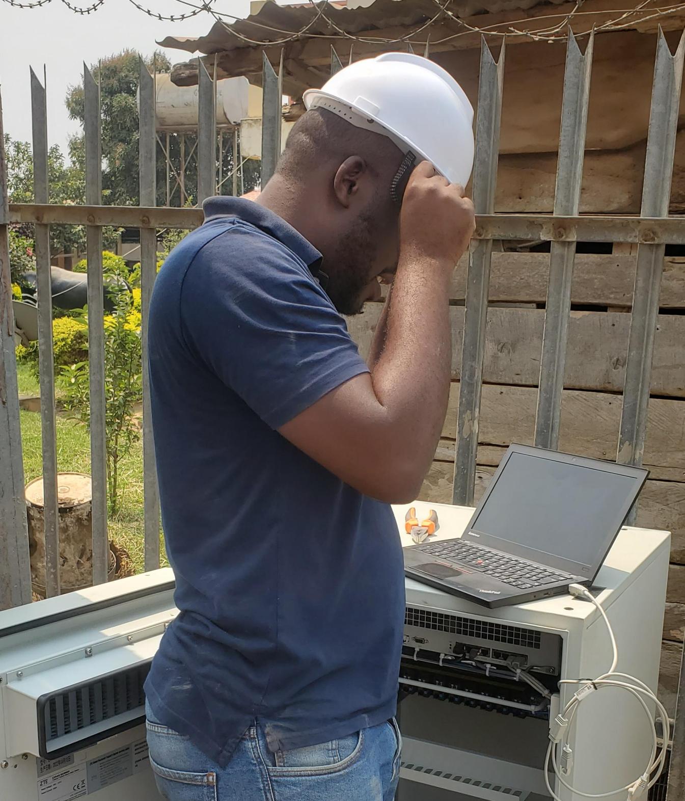 electrician installing panel